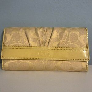 100% Authentic Signature Coach wallet with leather trim
